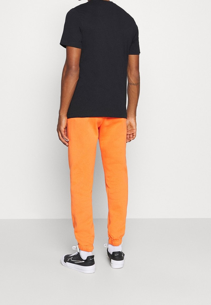 Nike Sportswear Triko s potiskem - black