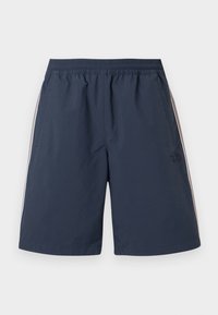 Σορτς αθλητικά σε ναυτικό μπλε με ελαστική μέση, πλαϊνές τσέπες και λεπτές λευκές ρίγες κατά μήκος των εξωτερικών πλευρών.