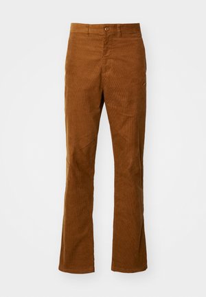 Bruine corduroy flared pants met een vlakke voorkant, een enkele knoopsluiting en zijzakken. De textuur is ribbelig, wat zorgt voor een zachte, duurzame feel.