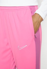 Nike Performance ACADEMY PANTS - Jogginghose - pink glow/cosmic fuchsia/white