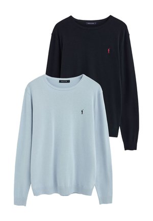 To langærmede crewneck-trøjer, en lyseblå og en sort, hver med et lille broderet polo-spiller logo på brystet.