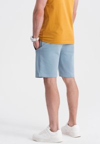 Ombre Teplákové kalhoty - light blue