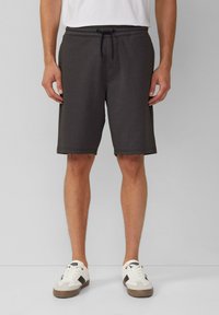 Gray athletic shorts made of soft fabric, featuring an elastic waistband with a drawstring and side seams, reaching just above the knees.
