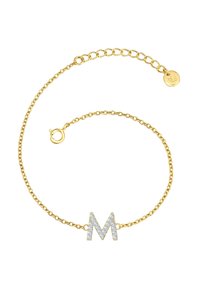 Gold chain bracelet featuring a studded letter 'M' in silver. Oval links, adjustable length, and lobster clasp closure. Shiny, polished finish.