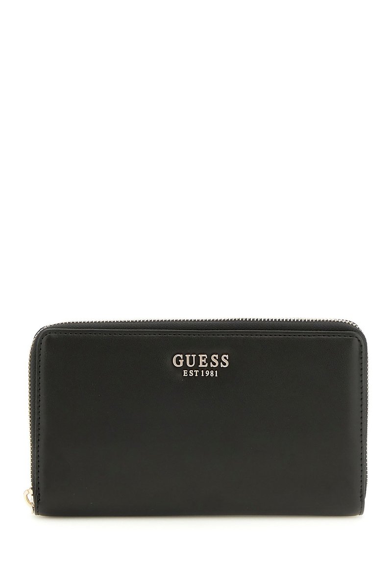 Portafoglio in pelle nera con chiusura zip, logo dorato "GUESS EST1981" e una texture liscia senza motivi visibili.