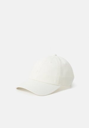 White cotton baseball cap with a curved brim, six-panel design, and discreet logo on the front. Features ventilation eyelets for breathability.