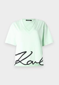 SIGNATURE OVERSIZED V-NECK - Print T-shirt - spray