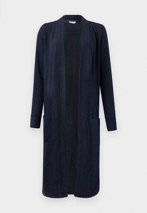 Marineblauwe lange cardigan met open voorkant, lange mouwen en twee voorzakken. Gemaakt van zachte stof met een gladde textuur.