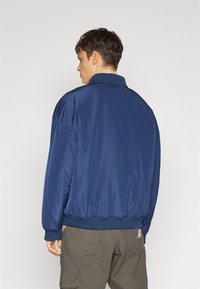 Wrangler TRANSITIONAL JACKET - Allvädersjacka - black iris
