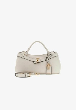 Sac à main beige clair de créateur avec poignées supérieures, bandoulière amovible, petit cadenas doré et étiquette de marque avec breloques clés.