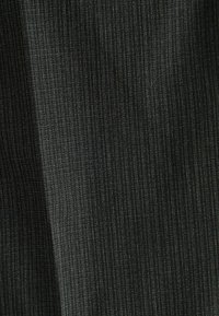 Black fabric with a subtle pinstripe pattern, featuring a smooth texture and a slight sheen, suitable for various clothing applications.