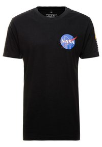 Black cotton t-shirt featuring a blue circular NASA logo on the chest and text detailing along the left sleeve. Classic crew neck design.