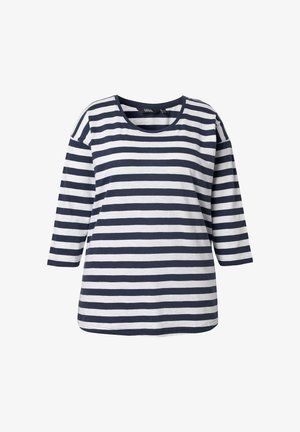 Chemise à rayures bleues marines et blanches à manches longues avec un col rond et une coupe ample, présentant des rayures horizontales de largeurs variées.