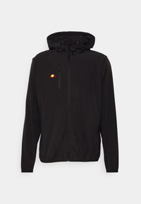 Chaqueta ligera negra con capucha, cremallera completa, puños elásticos y un pequeño logo multicolor en el lado izquierdo del pecho. Textura suave.