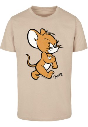 Beige pamut póló, amelyen egy rajzfilm egér szerepel. A design fekete kontúrokkal rendelkezik, és a karakter alatt egy aláírás található.