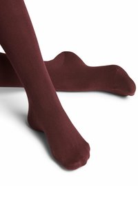 Calzini bordeaux con una texture liscia e un design aderente. Presentano un punta senza cuciture e un polsino a coste per una calzata sicura.