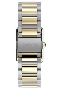 Montre en métal bicolore avec un bracelet en acier inoxydable argenté et or, face rectangulaire, finitions brossées et polies, arborant le logo "TIMEX".