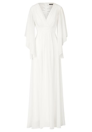 Long white dress with a v-neckline, flowing, flared sleeves, and gathered waist detail. Made of a light, textured fabric.