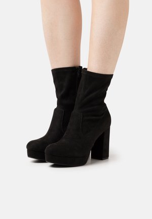 Platform ankle boots - black
