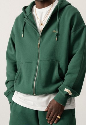 Vetoketjullinen college - dark green