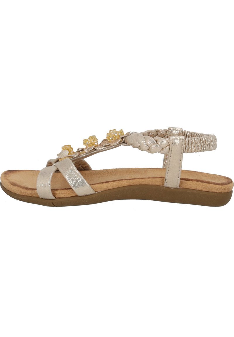 Vlakke sandaal in metallic zilver met gevlochten banden en gele bloemenaccenten. Gevoerde voetbed en flexibele beige zool.