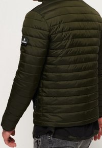 Superdry & Co Zimní bunda - dark green