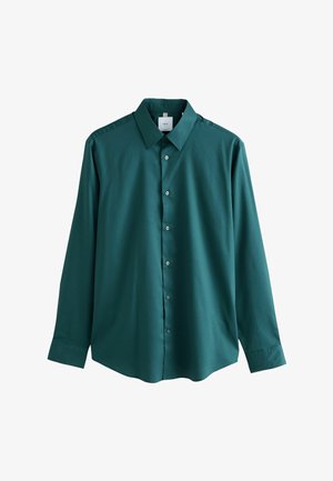 Cămașă albastră cu mânecă lungă, de tip button-up, cu guler ascuțit, textură netedă și nasturi argintii, având un tiv ușor rotunjit.
