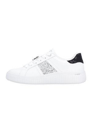 White low-top sneaker with white laces, silver glitter stripe on side, black glitter heel patch, and thick ridged sole.