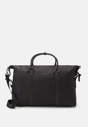 Black large duffel bag with two handles, adjustable shoulder strap, and Valentino logo on front center.