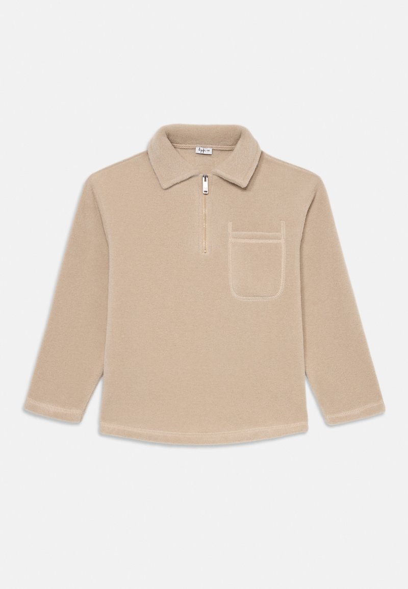 Béžový fleece pulover s malým zipsovým golierom, prednou kapsou, dlhými rukávmi a zaobleným lemom. Mäkká textura s minimálnym šitím.