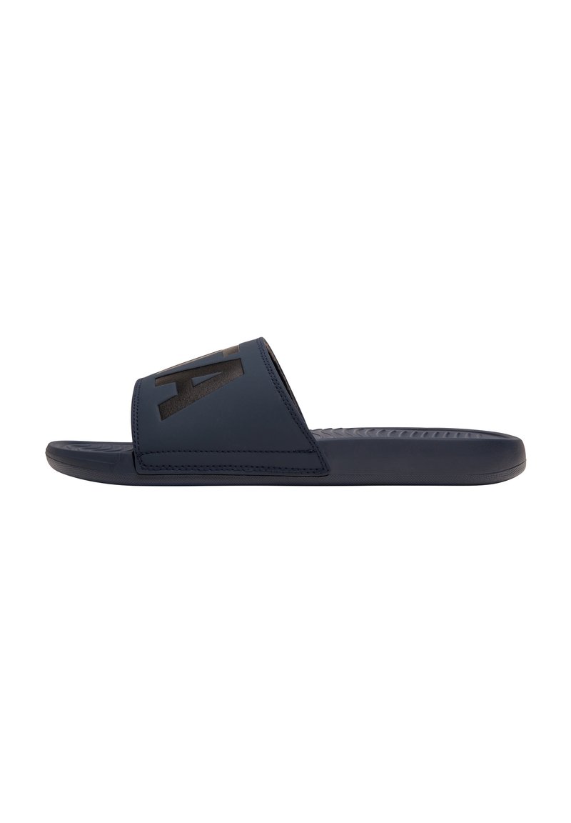 Navy slide sandal made of smooth synthetic material with a wide strap featuring a black logo. Textured outsole for grip, flat design.