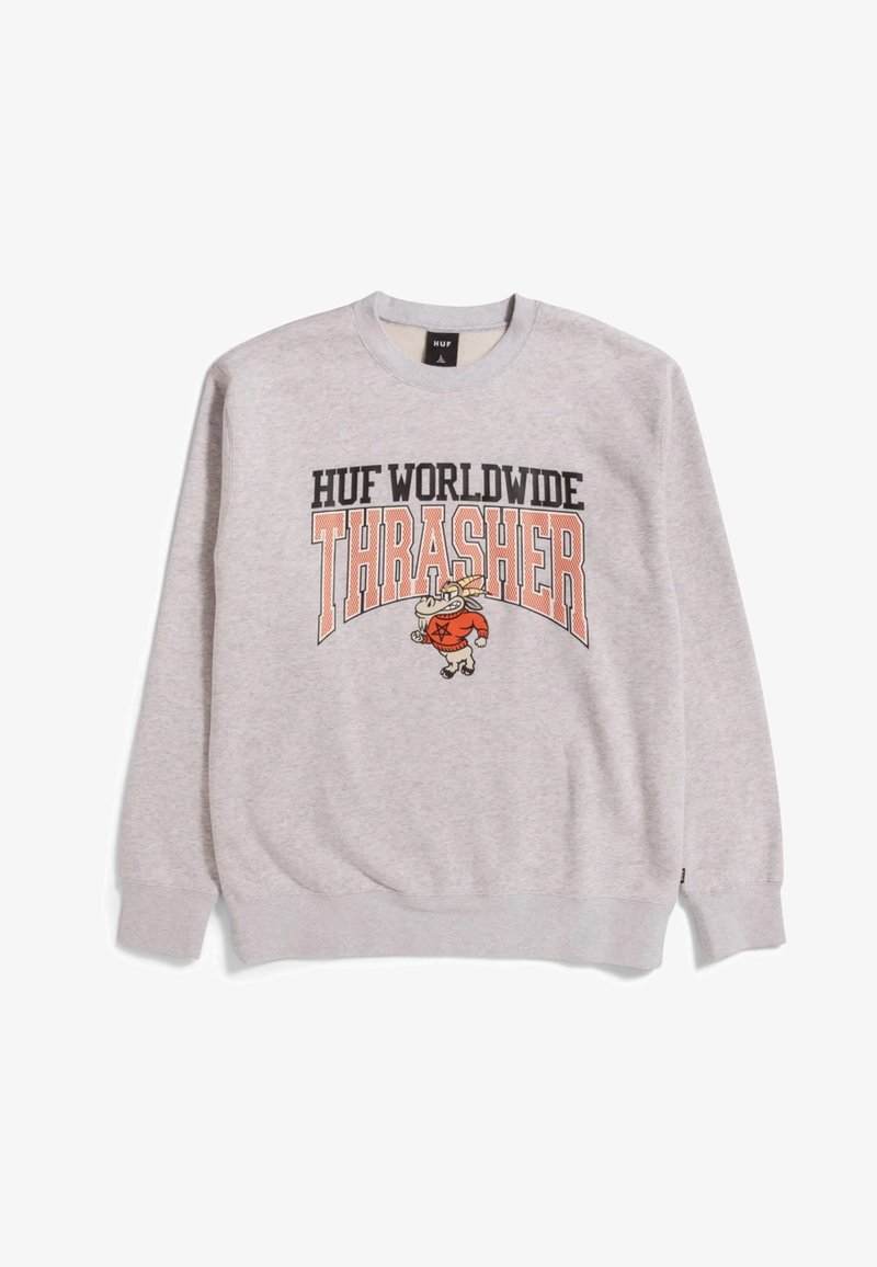 Sweat-shirt gris clair avec texte "HUF WORLDWIDE THRASHER" et personnage de dessin animé portant un sweat à capuche rouge au centre devant.