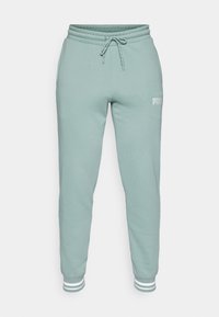 UNITED SWEATPANTS  - Pantalones deportivos - green moon