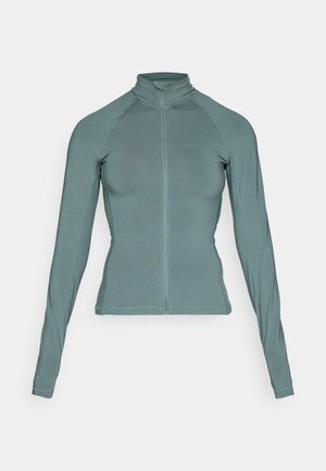 Sudadera de manga larga y cremallera en un color verde apagado. Confeccionada en un material suave y elástico, con mangas raglán y detalles de costura mínimos.
