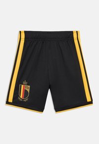 Melni sporta šorti ar dzeltenām sānu svītrām, uz kuriem attēlots ģerbonis ar kroni un tekstu "Royal Belgian FA 1895". Izgatavoti no elastīga materiāla.