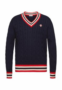 Pull en tricot à col en V bleu marine avec bordures rayées rouge, blanc et noir sur le col, les poignets et l'ourlet, avec un petit patch logo sur la poitrine.