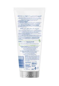 Rückseite der 200 ml NIVEA Q10 straffenden und belebenden Body-Serum-Lotion Tube mit Produktdetails in Deutsch und Französisch.