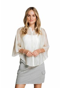 White, sheer button-up shirt with wide sleeves over a light gray skirt featuring cargo pockets and a relaxed fit. Smooth, lightweight fabric.