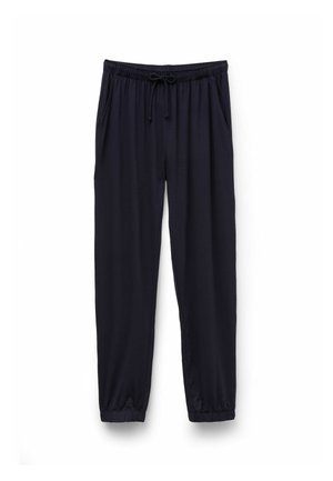 Pantalones jogger negros con cintura elástica y cordón, con bolsillos laterales y puños elásticos, exhibidos sobre un fondo blanco.