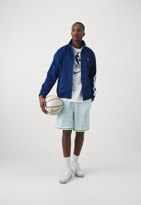 Nike Performance DNA SHORT - Sports shorts - glacier blue/barely volt/bright mandarin