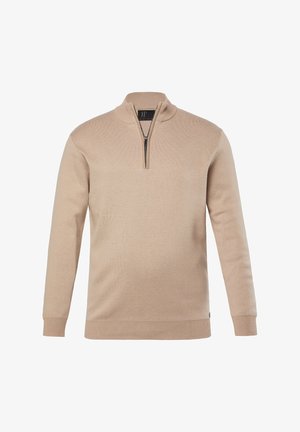 Beige strikket pullover med høj krave og halv lynlås. Har ribbede manchetter og kant, glat tekstur og et minimalistisk design.