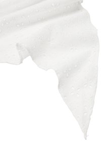 Biała haftowana tkanina z kwiatowymi wzorami i małymi wycięciami. Miękka w dotyku, lekka i o kroju z falującymi, nierównymi brzegami.