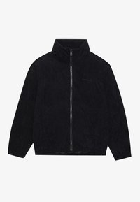 Veste zippée en velours côtelé noir avec un col haut, texture côtelée et ourlet élastiqué. Présente un logo discret sur la poitrine.