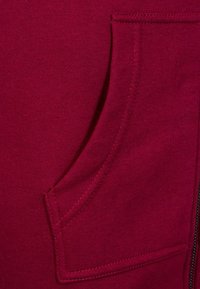 Urban Classics Športna jopa s kapuco na zadrgo - red