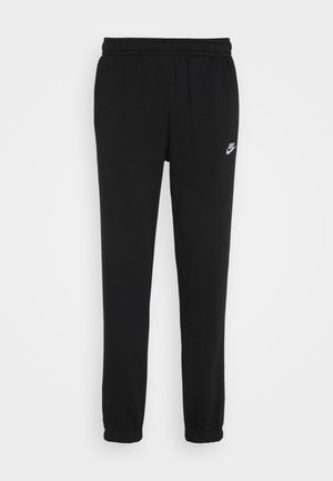 Black sweatpants with an elastic waistband, cuffed ankles, and a small white Nike logo on the left side. Made from soft textured fabric.