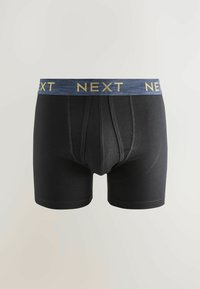 Fekete boxer alsónadrág sötétkék elasztikus derékkal, arany színű "NEXT" felirattal. Puha, ruganyos anyagból készült, sima felülettel.