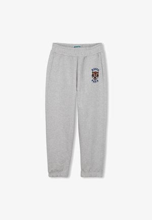 Pantalon de survêtement gris en tissu doux avec taille et poignets élastiques. Présente un logo Kenzo Paris brodé et un motif de tigre sur la cuisse gauche.