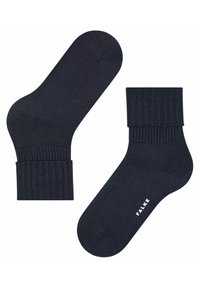 Calzini blu navy a lunghezza media realizzati in materiale a coste, con caviglia imbottita e punta liscia, con logo "FALKE" in bianco nella parte inferiore.