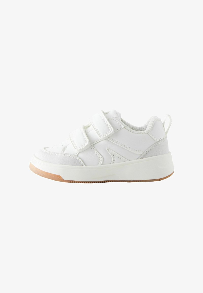 White athletic shoe made of synthetic material with two Velcro straps. Features a rubber sole and textured detailing along the sides.