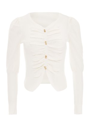 Weißer gerippter Cardigan mit taillierter Form, gerafften Details an der Vorderseite und drei goldfarbenen Knöpfen zum Schließen. Lange Ärmel mit gepufften Schultern.